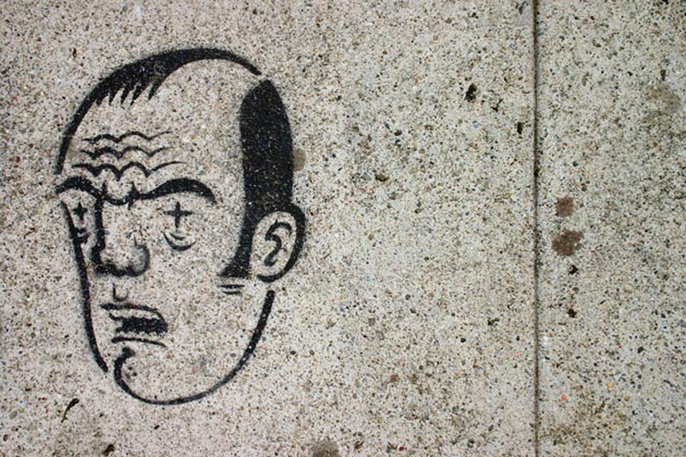 a sidewalk face, photographed by jeff michael